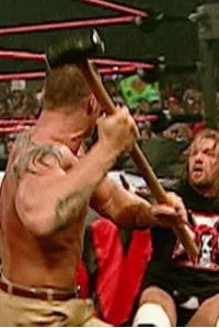 WWE Raw – S12E35 – Randy Orton introduces Triple H to a sledgehammer