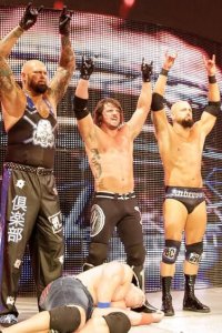 WWE Raw – S23E78 – Seth Rollins and The Club standing tall.